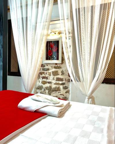Postel nebo postele na pokoji v ubytování Olea Sığacık Pansiyon & Bistro