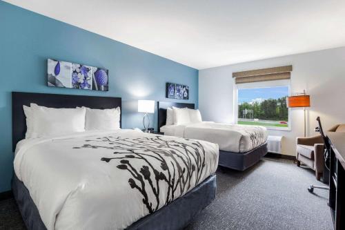 Katil atau katil-katil dalam bilik di Sleep Inn Winfield - Teays Valley