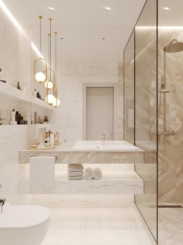 a white bathroom with a tub and a sink at Dream Apartment in Bila Tserkva