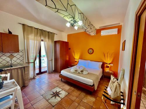 A bed or beds in a room at Tropea Casa Scirocco