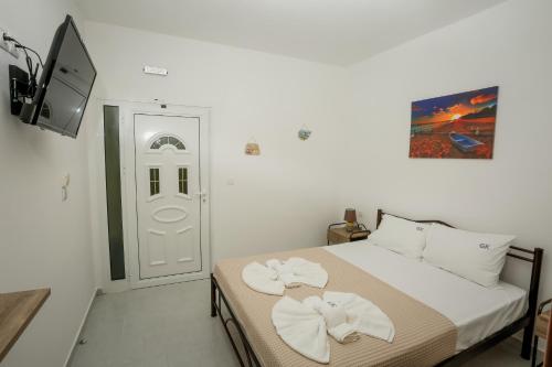 Postel nebo postele na pokoji v ubytování GK Houses #2