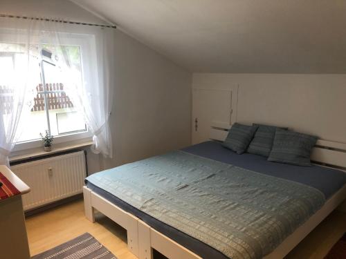 Postel nebo postele na pokoji v ubytování Apartment Sabine