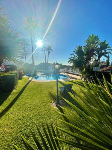 Modern garden apartment with a fantastic sea view and a private garden