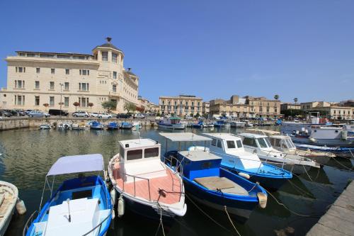 Zdjęcie z galerii obiektu La Finestra su Ortigia Luxury w Syrakuzach