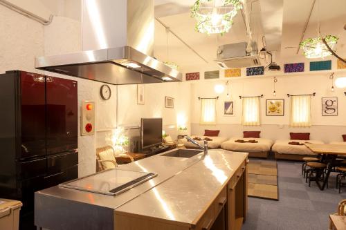 a kitchen with a counter top in a room at VERY in Naha