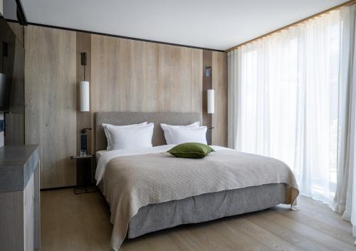 Una cama o camas en una habitación de Hotel Hirschen Horn