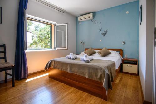 Postel nebo postele na pokoji v ubytování Accomodation STERMASI