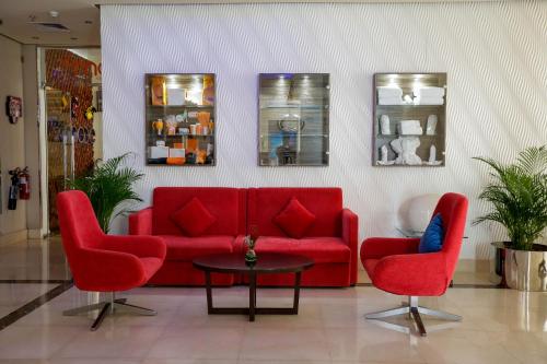 Posezení v ubytování MENA ApartHotel Albarsha At The Mall