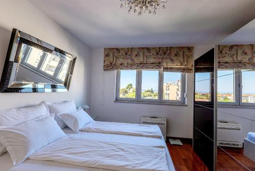 Posteľ alebo postele v izbe v ubytovaní Apartmant Split Centar Soleo