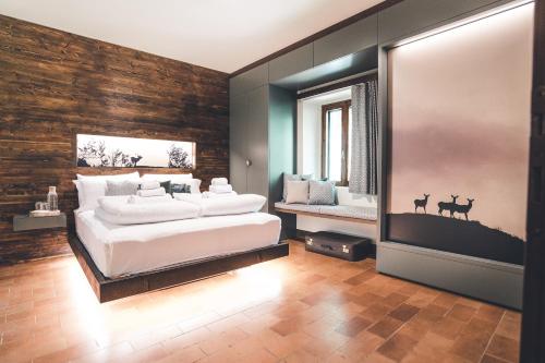 Postel nebo postele na pokoji v ubytování Rifugio Pian di Rocchi