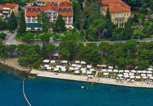 an aerial view of a resort next to the water at Hotel Marko in Portorož