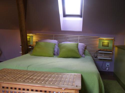 Кровать или кровати в номере gite rural de La Neuville Roy