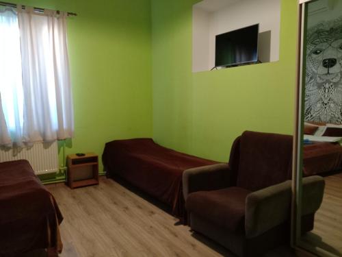 Televisyen dan/atau pusat hiburan di Mini-Hotel Ocean