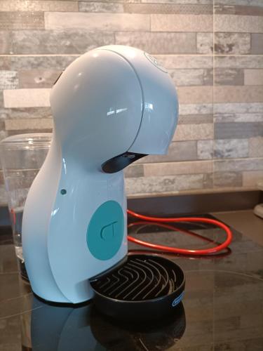 a hair dryer sitting on a table with a cord at La Torre del Indiano-Villa- in Santander