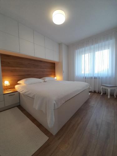 Posteľ alebo postele v izbe v ubytovaní Sea View Apartment Macolic