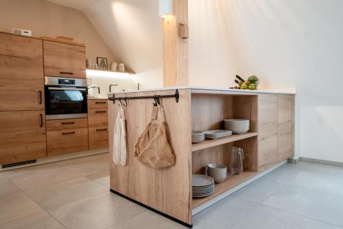Kuchyň nebo kuchyňský kout v ubytování Ferienwohnung heimatselig Wolframs-Eschenbach
