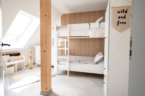 Postel nebo postele na pokoji v ubytování Ferienwohnung heimatselig Wolframs-Eschenbach