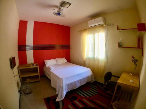 מיטה או מיטות בחדר ב-Kër Adja