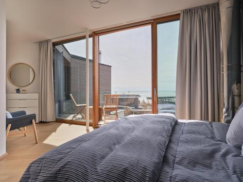 Postel nebo postele na pokoji v ubytování Exklusives Ferienhaus - Direkt am Neusiedler See