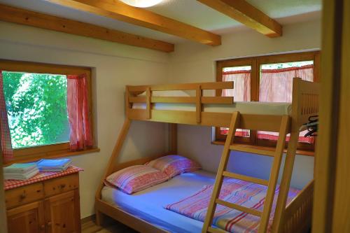 a bedroom with two bunk beds in a cabin at Apartment Green Lagoon in Bihać