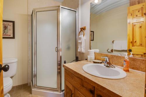 a bathroom with a sink and a shower at Garden City Gem in Garden City