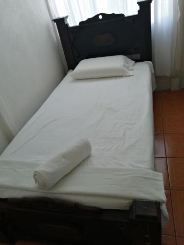 Ένα ή περισσότερα κρεβάτια σε δωμάτιο στο Casa Los Ángeles