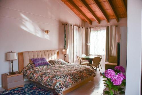 Giường trong phòng chung tại Villa Luz