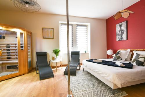 Ένα ή περισσότερα κρεβάτια σε δωμάτιο στο Sauna - Le 65 Degrés - Gare