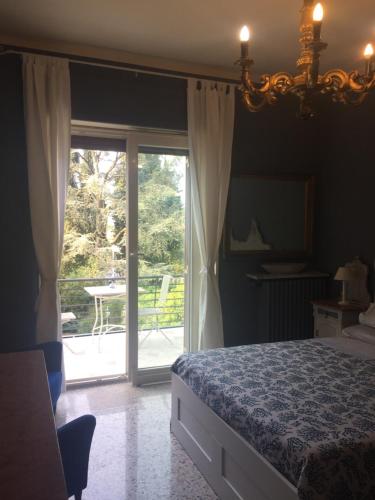 En eller flere senger på et rom på B&B La Villa Mediterranea