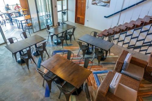 an overhead view of tables and chairs in a room at AV Suites in Puerto Galera