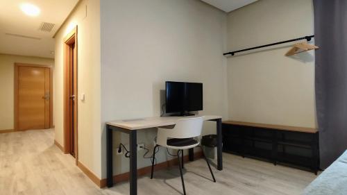 TV a/nebo společenská místnost v ubytování Smart Hotel La Sagra