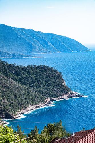 an island in the middle of a large body of water at Casa Di Pietra in Fethiye