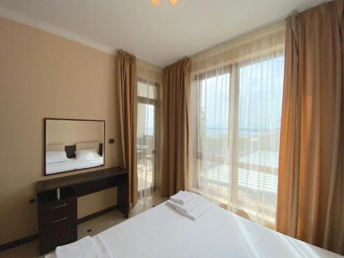 Posteľ alebo postele v izbe v ubytovaní Tryavna Beach - Private Apartment - BSR