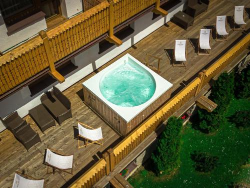an overhead view of a hot tub on a deck at Tatra House Residence in Zakopane
