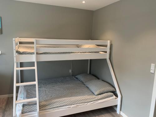 a white bunk bed in a room at Jerup Bed & Breakfast in Jerup