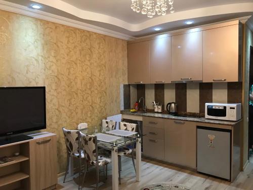 Orbi Towers Batumi tesisinde mutfak veya mini mutfak