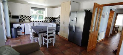 A kitchen or kitchenette at Lislary Cottage on Wild Atlantic Way