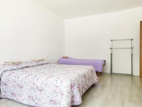 Posteľ alebo postele v izbe v ubytovaní Levico Al Corso Apartments