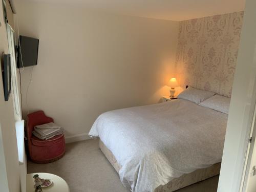 Postel nebo postele na pokoji v ubytování Yew Tree House