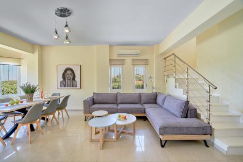 Χώρος καθιστικού στο Villa Moma