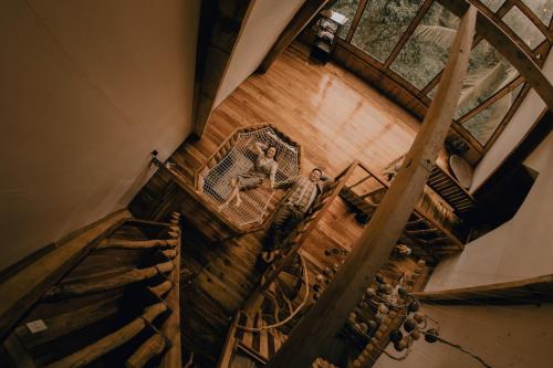 an overhead view of a staircase in a building at Camiguin Volcano Houses - A-Frame house in Mambajao