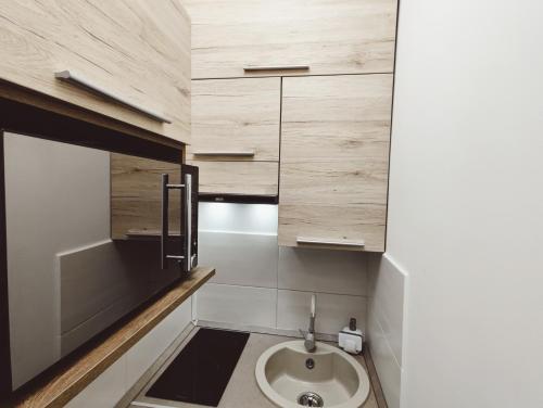 Ένα μπάνιο στο Central Palace Apartman