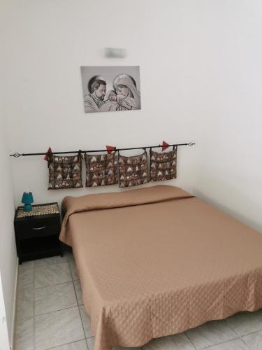 Ένα ή περισσότερα κρεβάτια σε δωμάτιο στο Stefano e Federica