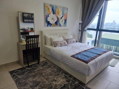 a bedroom with a bed and a chair and a window at Mines Astetica Lake View Condo Seri Kembangan v1 in Seri Kembangan