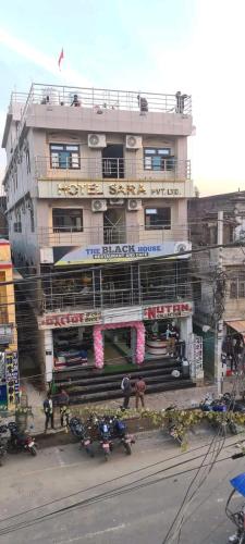 a building with motorcycles parked in front of it at Hotel Sara PVT LTD in Janakpur