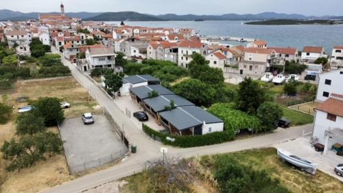 an aerial view of a town with houses and a street at ZEN MURTER Mobil home in Betina