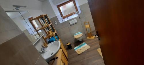 Vonios kambarys apgyvendinimo įstaigoje Ferienwohnung Seelust