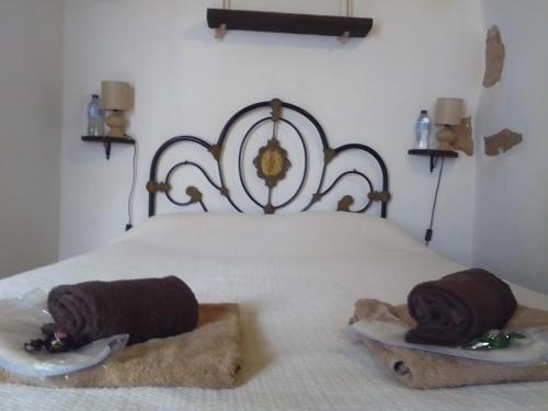 Ένα ή περισσότερα κρεβάτια σε δωμάτιο στο Villa Cecilio