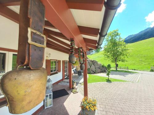 an outside view of a building with a view of a field at Haus Berg & Tal in Hirschegg