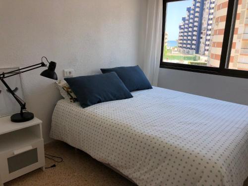 Postel nebo postele na pokoji v ubytování Apartamento Ca Batallera Playa Gandia